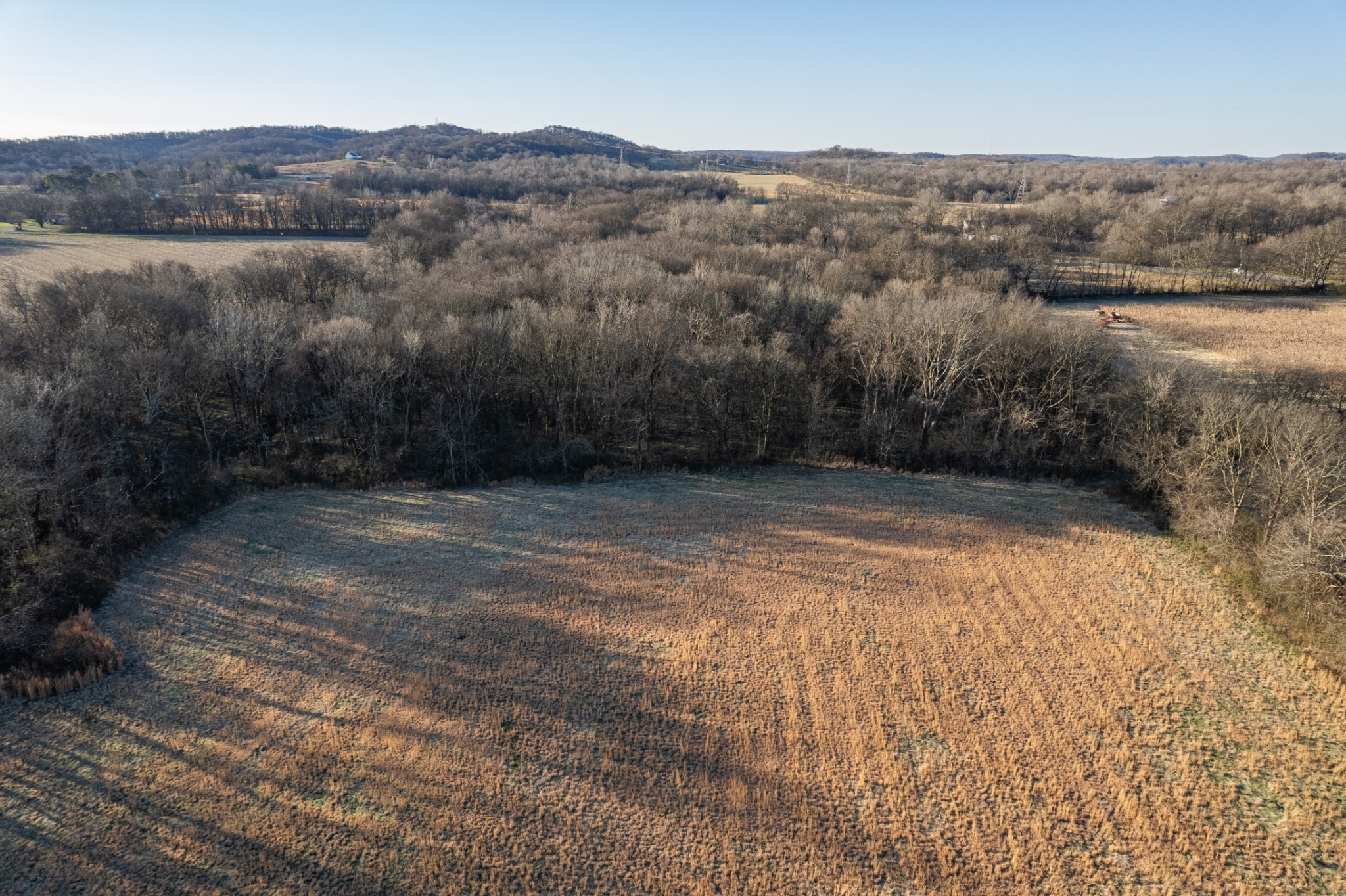 7729 Enterprise Road Mount Pleasant, TN 38474 - Photo 11 of 16 a view of a lake with mountains in the background