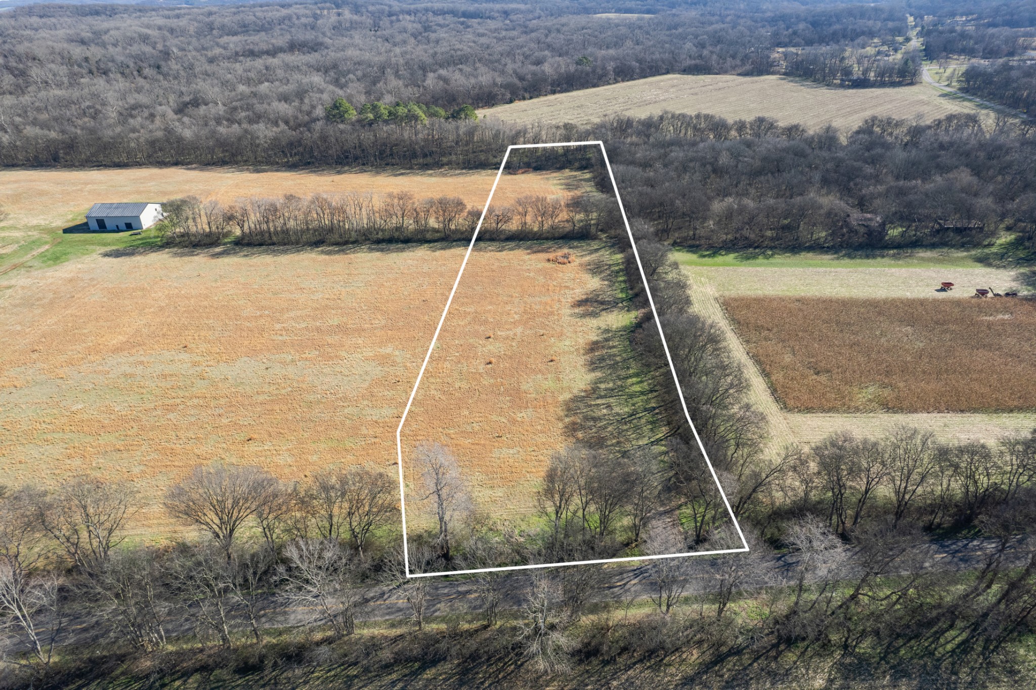 7729 Enterprise Road Mount Pleasant, TN 38474 - Photo 3 of 16 a view of a wooden floor