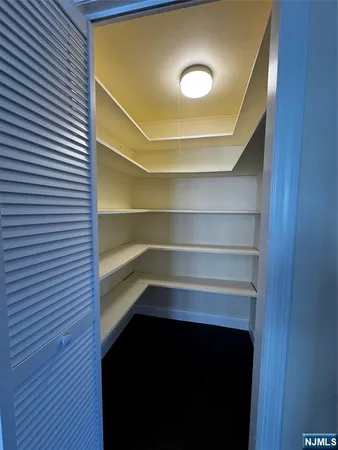 a room with a door and a wooden floor
