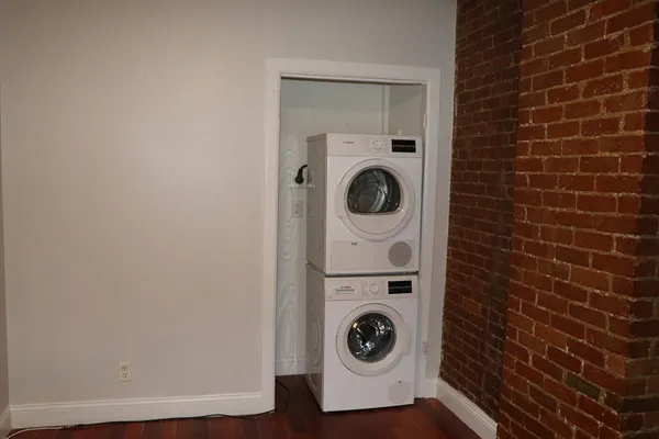 a utility room with dryer and washer