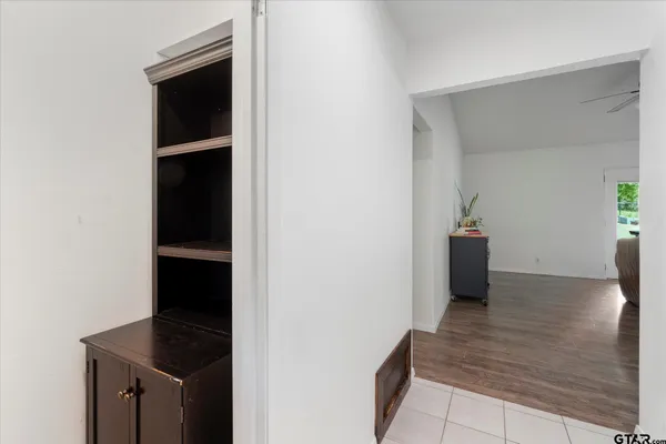 a view of a kitchen from the hallway