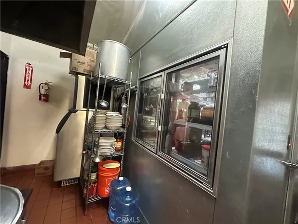 a view of a swimming pool with a table and chairs