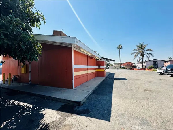 a view of a tables and chairs in patio