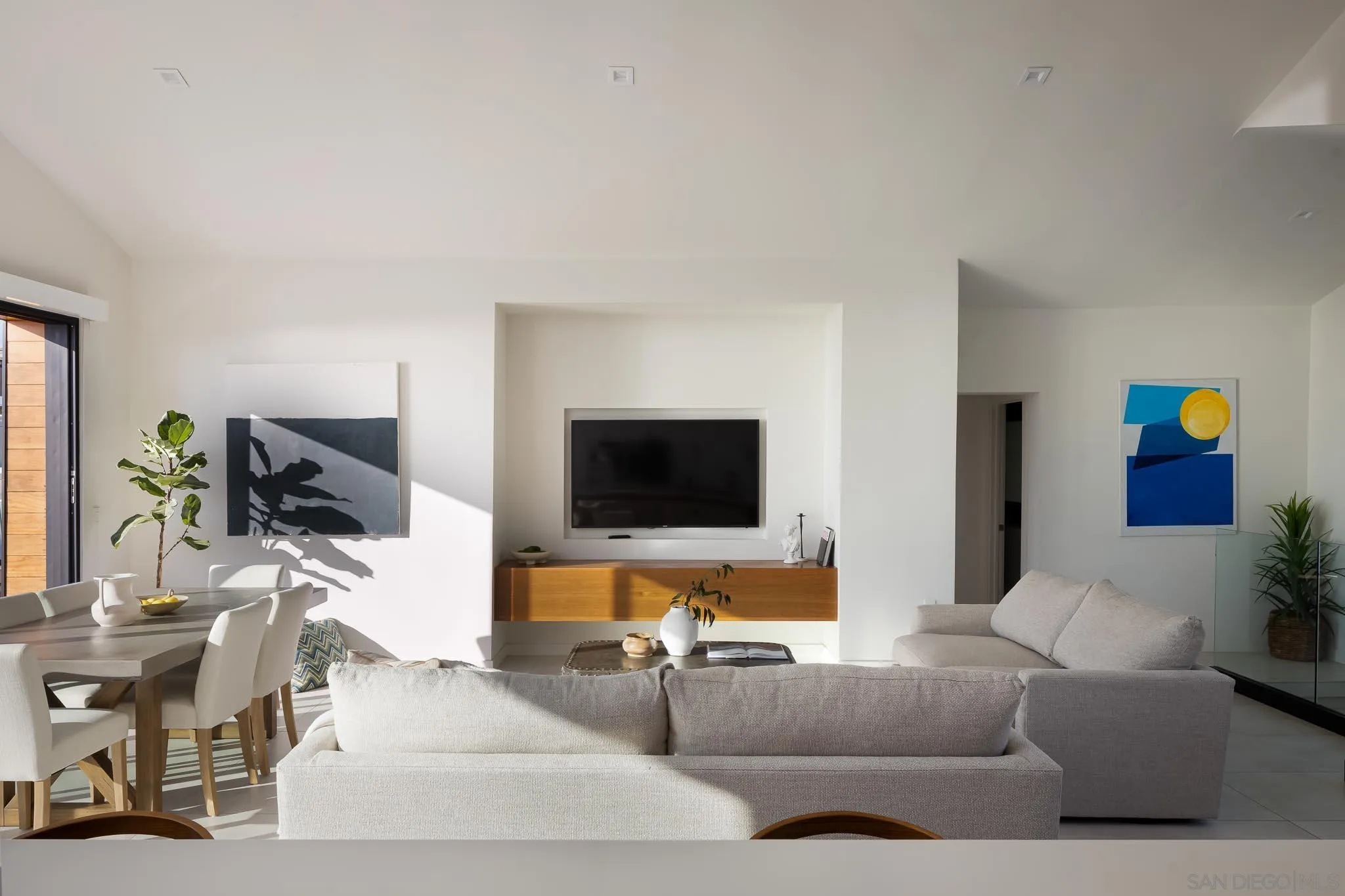 949 Cornish Drive San Diego, CA 92107 - Photo 11 of 28 a living room with furniture and a flat screen tv