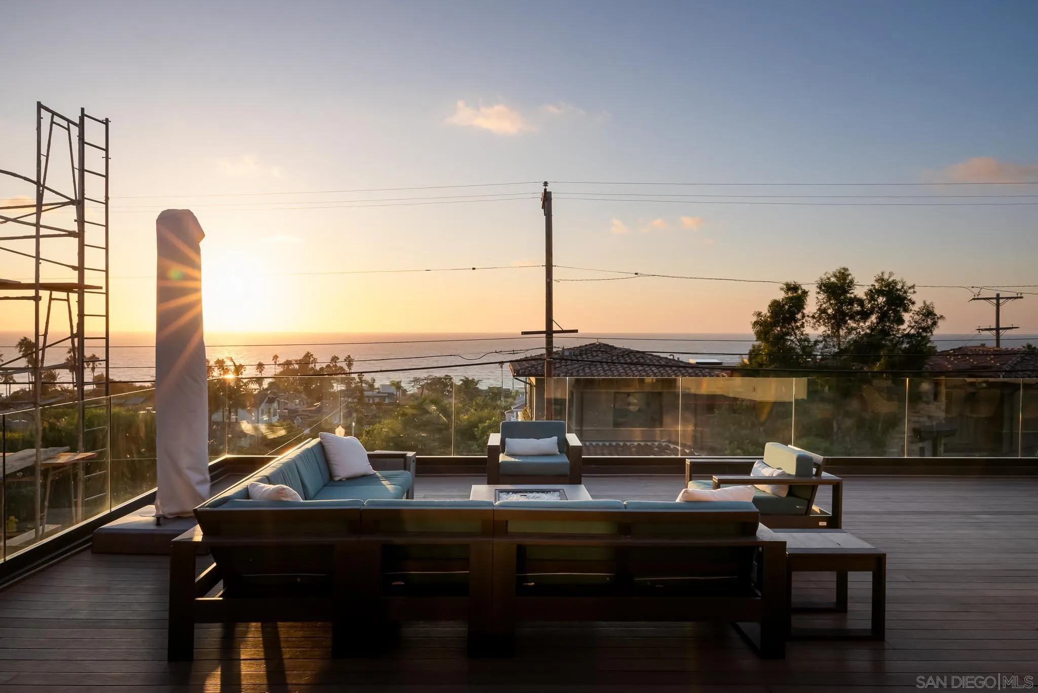 949 Cornish Drive San Diego, CA 92107 - Photo 14 of 28 a view of a balcony with lake view and wooden floor