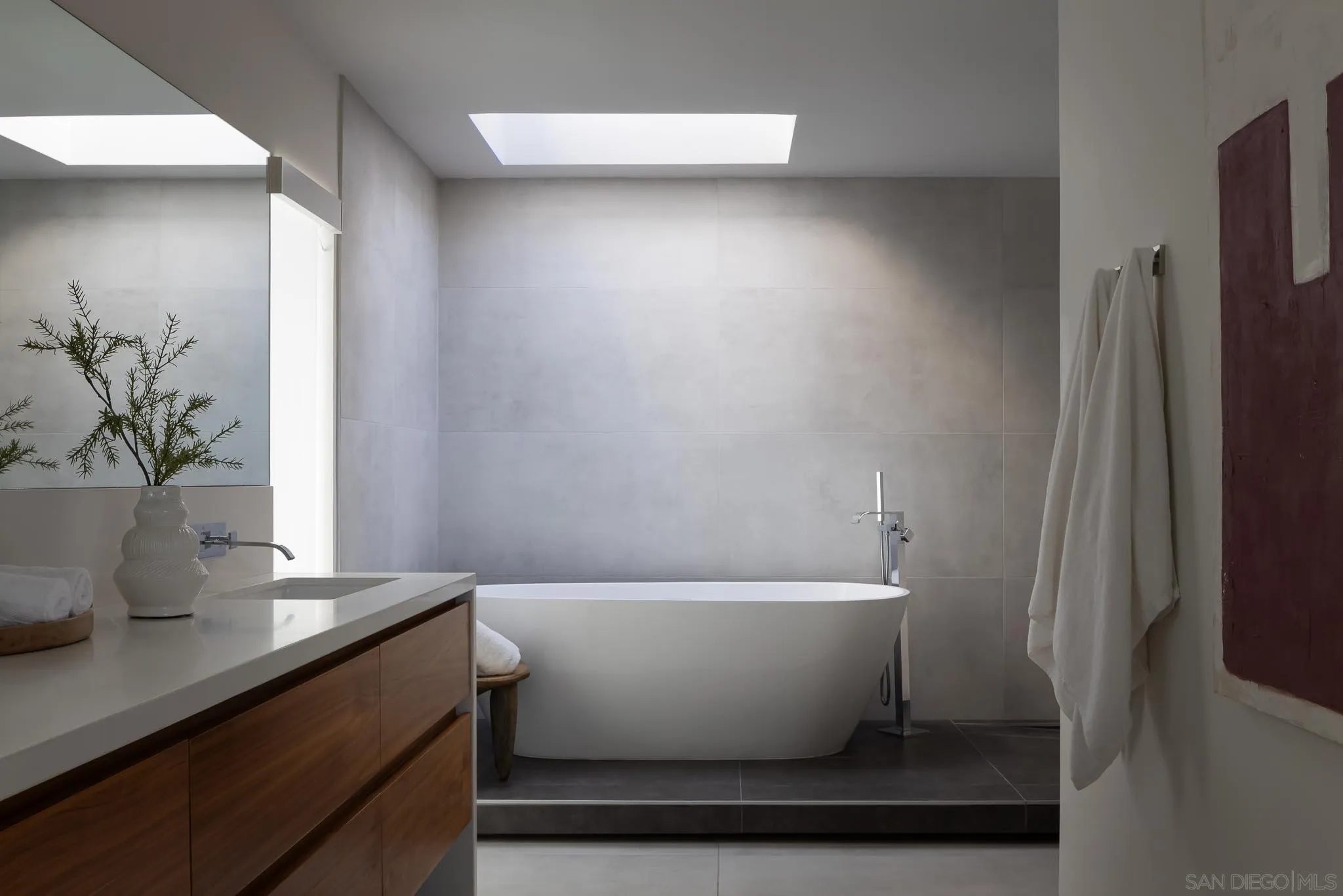 949 Cornish Drive San Diego, CA 92107 - Photo 19 of 28 a white bath tub sitting next to a white wall