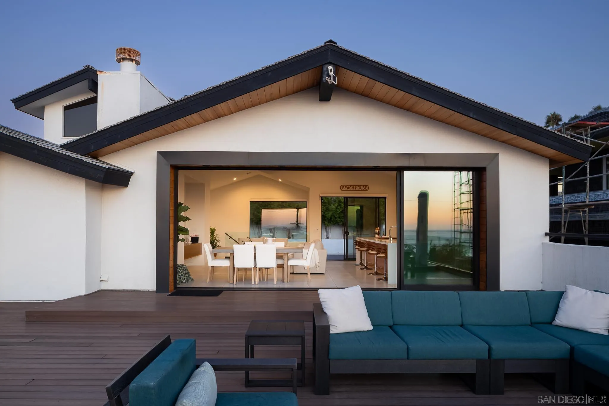 949 Cornish Drive San Diego, CA 92107 - Photo 20 of 28 a view of a house with couches chairs and wooden floor