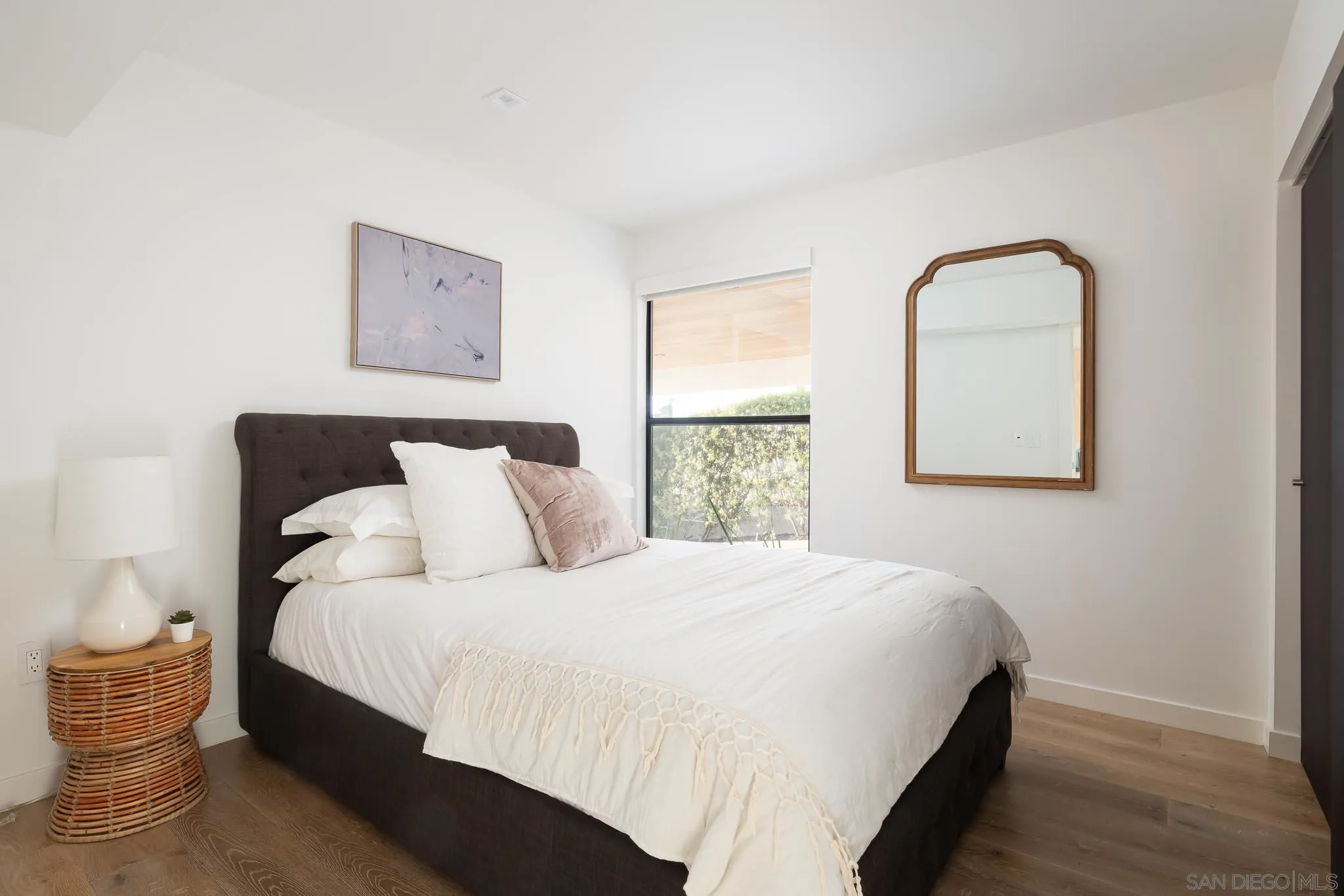 949 Cornish Drive San Diego, CA 92107 - Photo 24 of 28 a bedroom with bed and a window