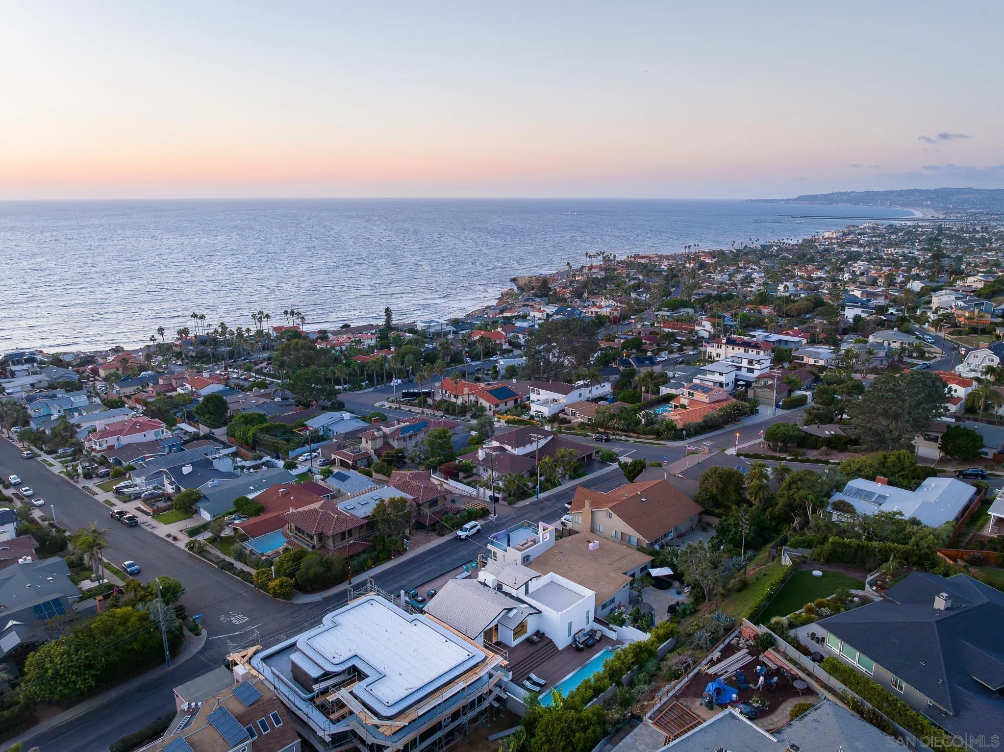 949 Cornish Drive San Diego, CA 92107 - Photo 3 of 28 an aerial view of residential houses with city view