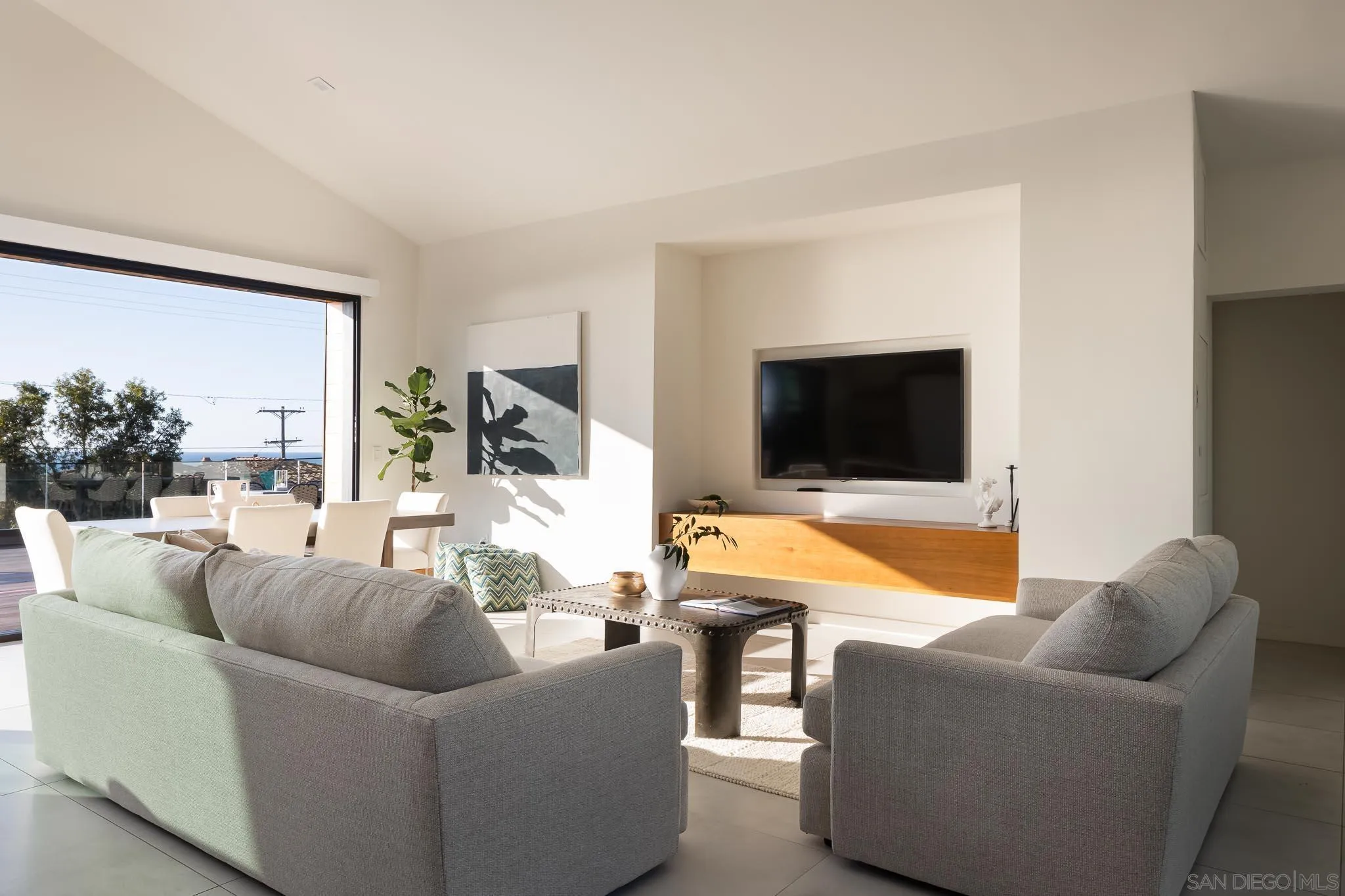 949 Cornish Drive San Diego, CA 92107 - Photo 10 of 28 a living room with furniture and a flat screen tv