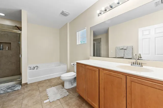 a room with cabinet and a window