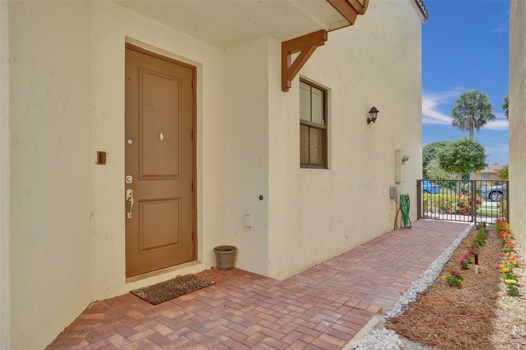 4875 Northwest 55th Place Tamarac, FL 33319 - Photo 6 of 44 a view of an front door