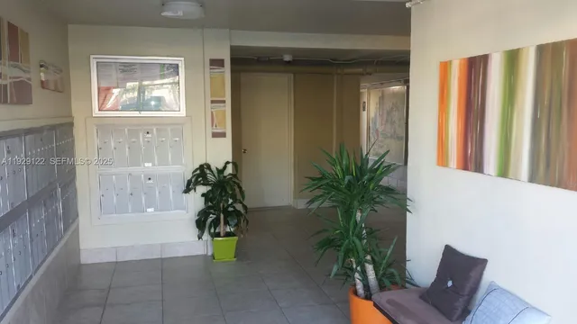 a view of livingroom with furniture and garden