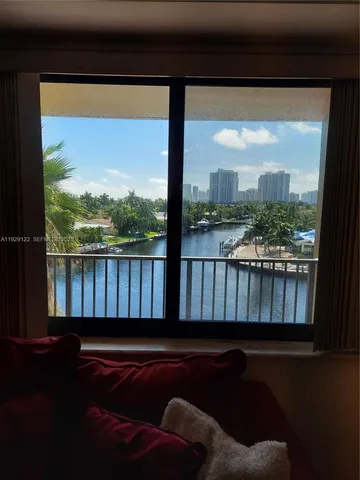 a view of balcony with furniture