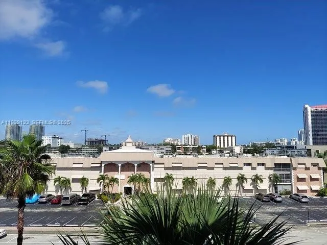 a view of a city with tall buildings