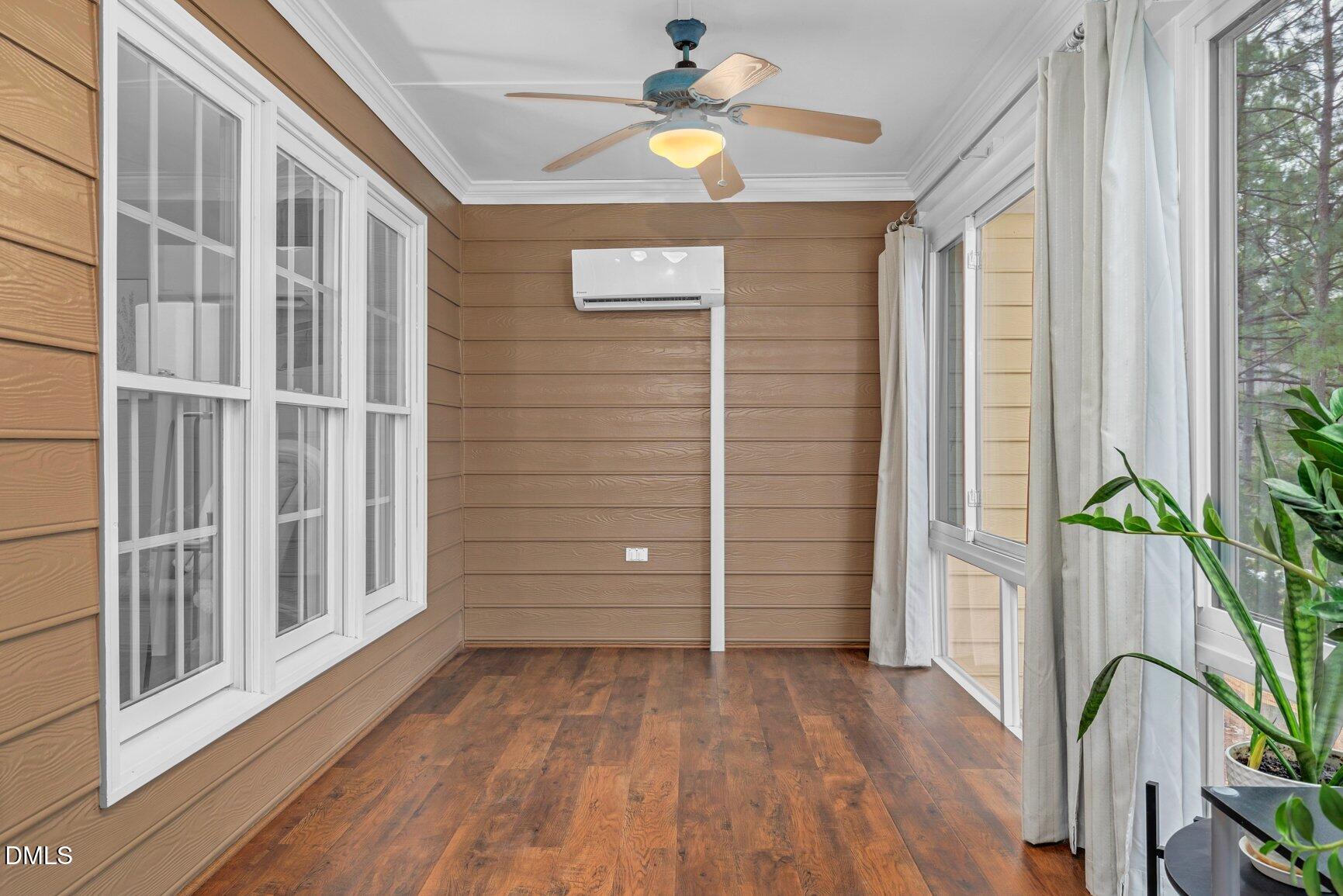 259 Sacred Fire Road Louisburg, NC 27549 - Photo 18 of 35 a view of an entryway with wooden floor and door