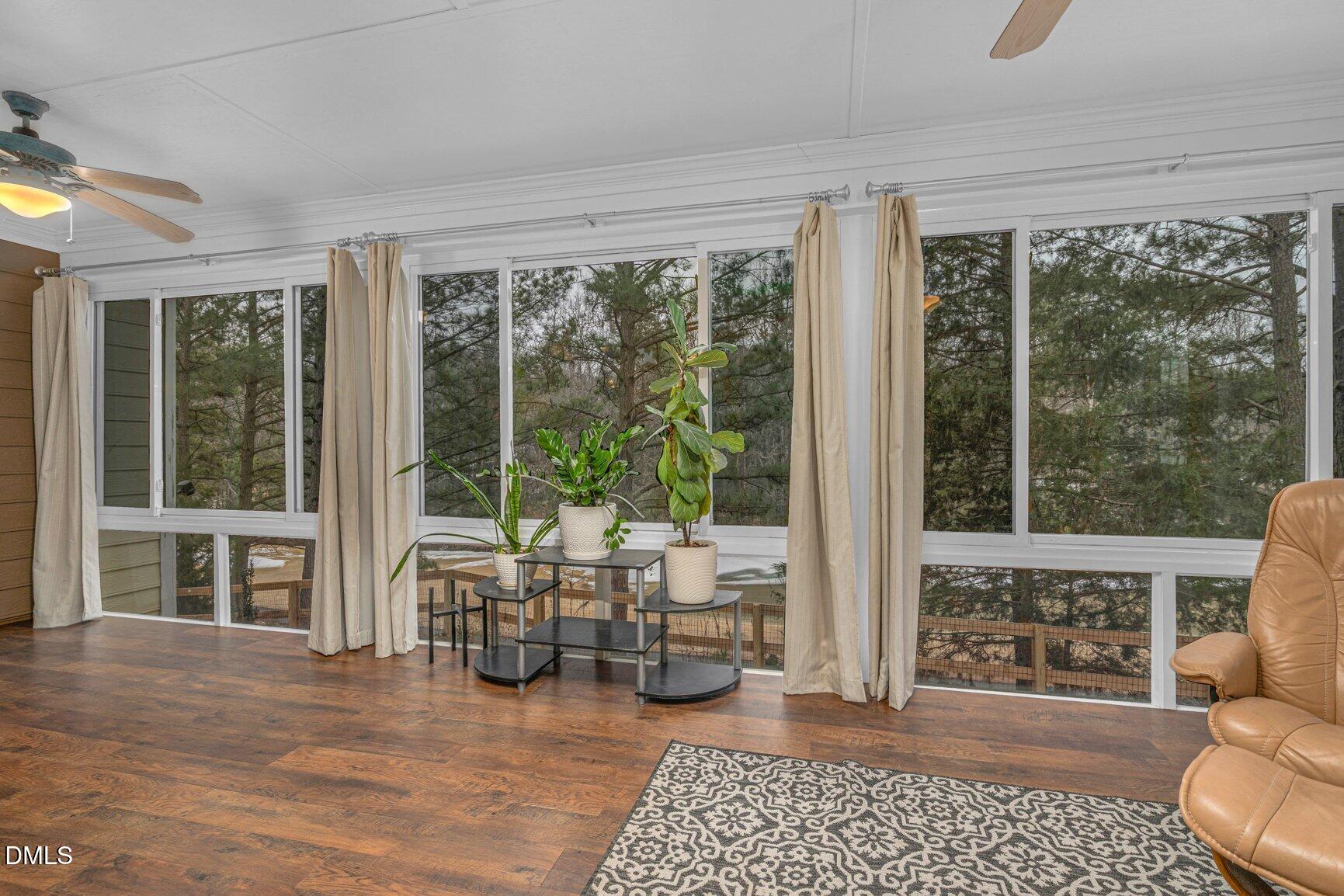 259 Sacred Fire Road Louisburg, NC 27549 - Photo 20 of 35 a living room with furniture and windows