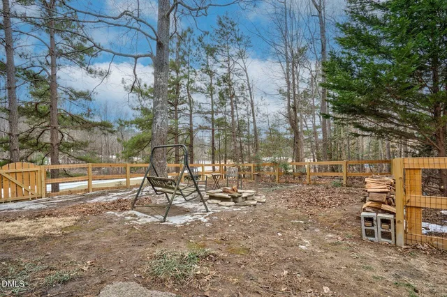 a view of a yard with an outdoor space