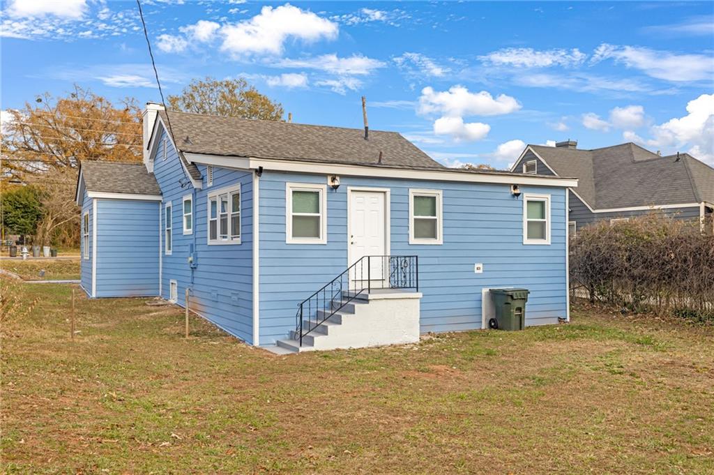 1683 Candler Road Decatur, GA 30032 - Photo 24 of 26 a view of a house with a yard