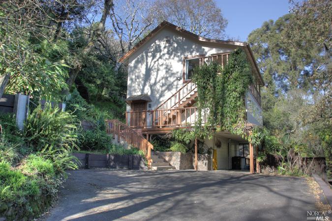 229 Courtright Road San Rafael, CA 94901 - Photo 1 of 1 a view of a large building with a tree in front of it
