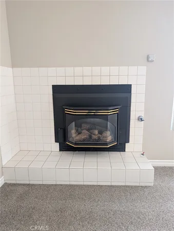 a living room with a fireplace