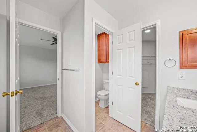a bathroom with a glass door shower