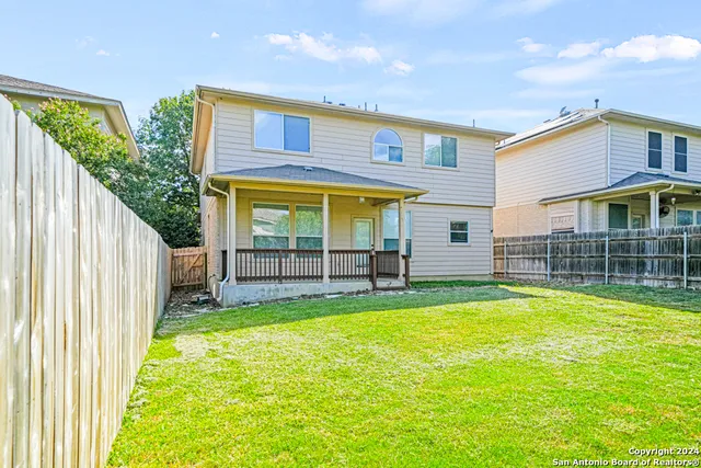 a view of a house with a swimming pool