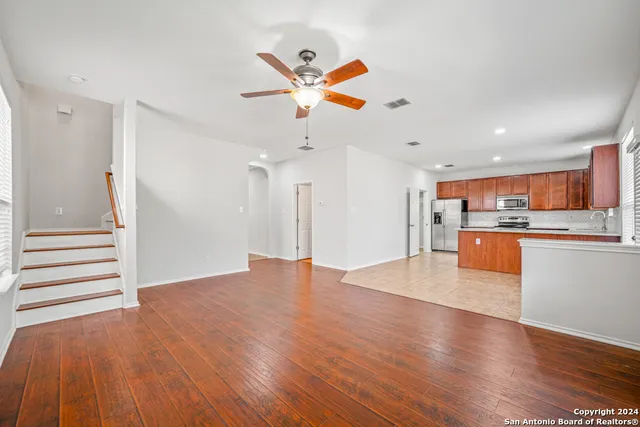 a view of kitchen with wooden floor and window