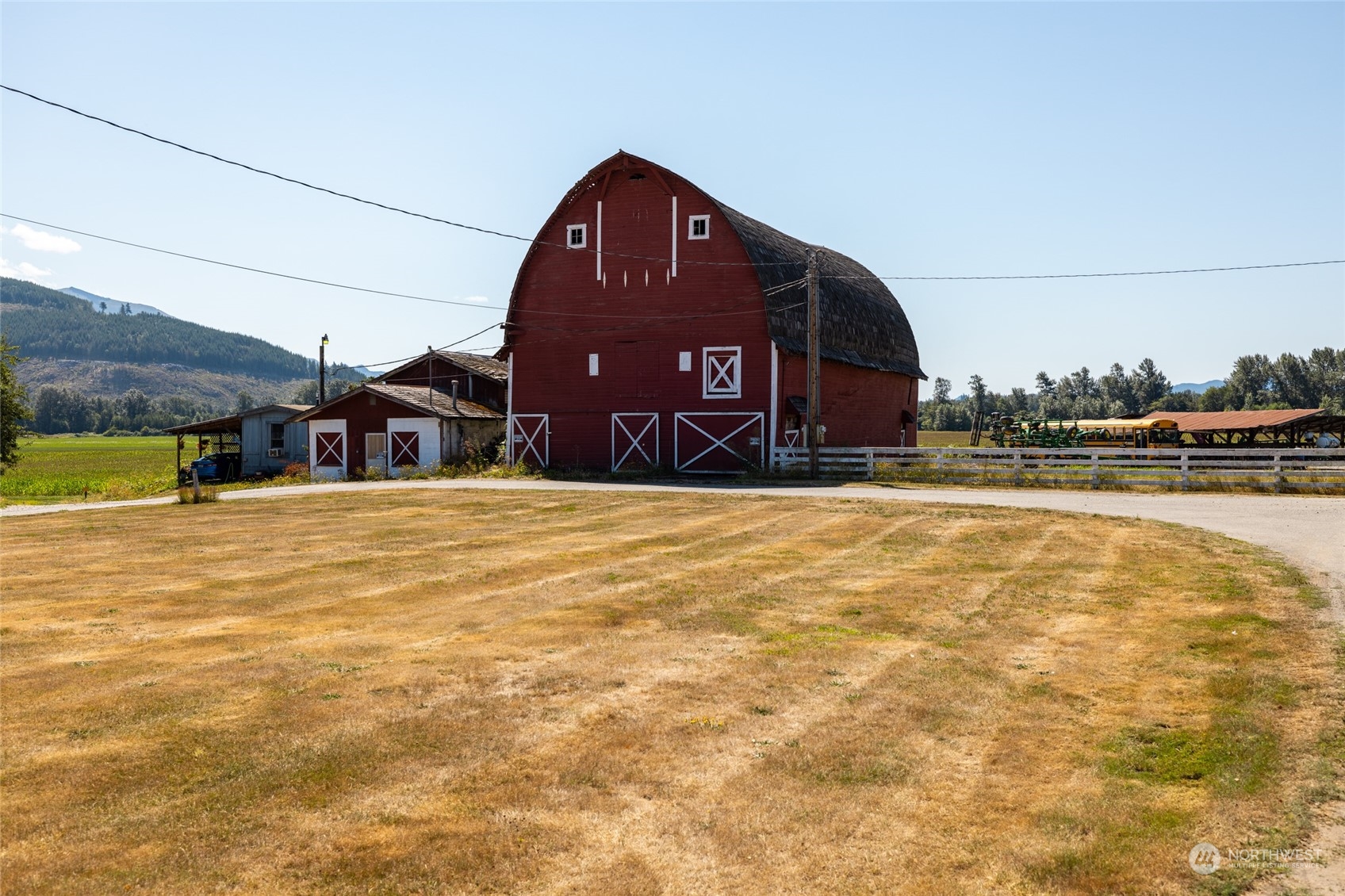22648 Rhodes Road Sedro-Woolley, WA 98284 - Photo 5 of 13 a front view of a house with a yard