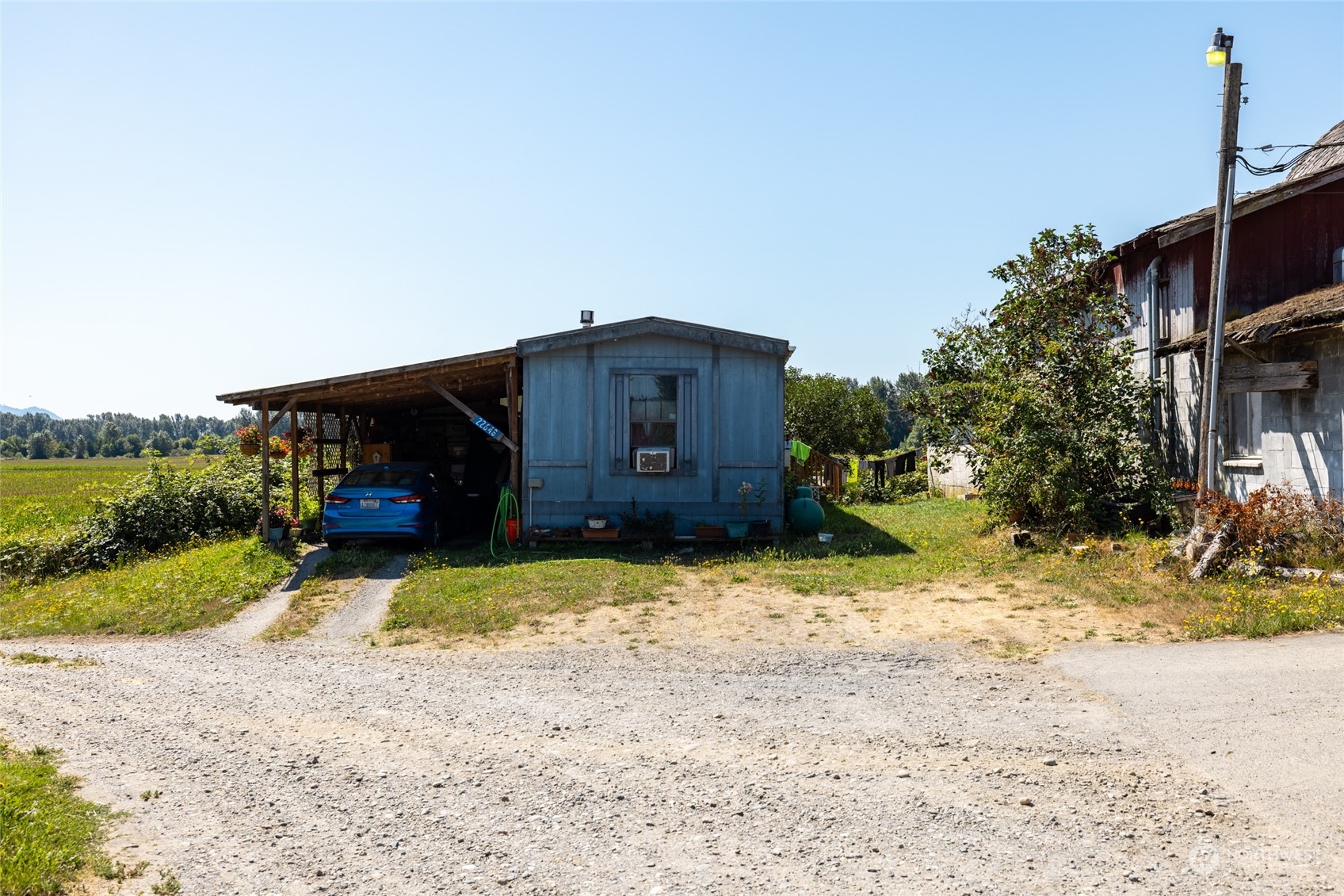 22648 Rhodes Road Sedro-Woolley, WA 98284 - Photo 9 of 13 a house view with a outdoor space
