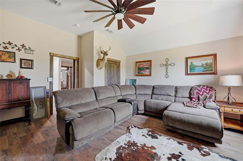 4652 Old Southmayd Road Sherman, TX 75092 - Photo 24 of 40 a living room with furniture and a couch