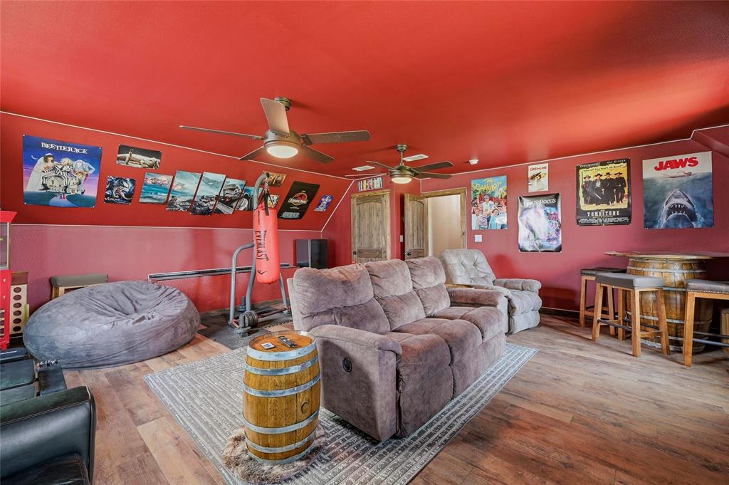 4652 Old Southmayd Road Sherman, TX 75092 - Photo 25 of 40 a living room with furniture and a floor to ceiling window