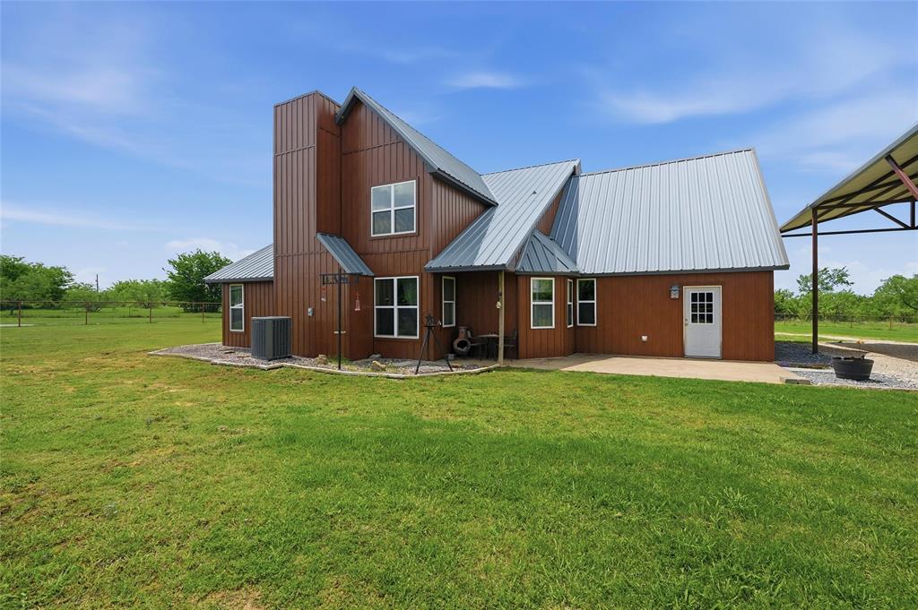 4652 Old Southmayd Road Sherman, TX 75092 - Photo 33 of 40 a view of a house with a backyard