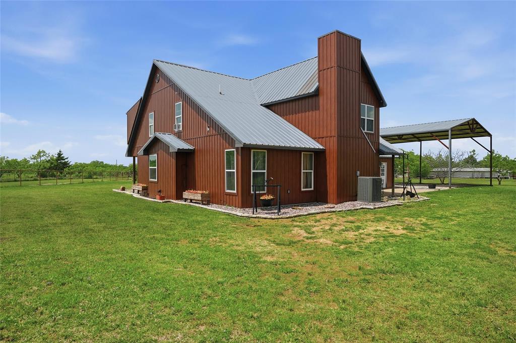 4652 Old Southmayd Road Sherman, TX 75092 - Photo 34 of 40 a view of a house with backyard and porch