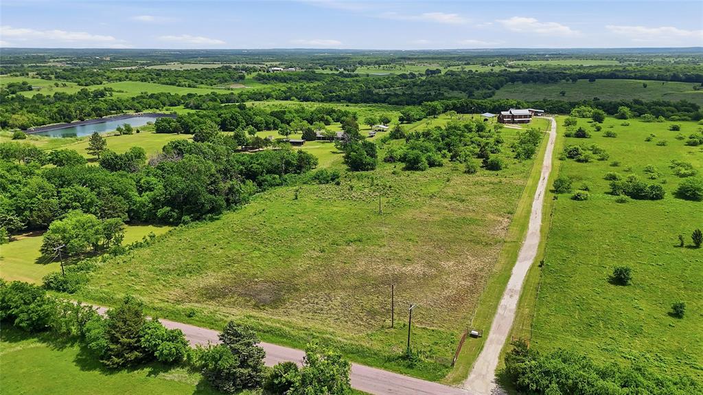 4652 Old Southmayd Road Sherman, TX 75092 - Photo 37 of 40 a view of a lush green forest with a houses