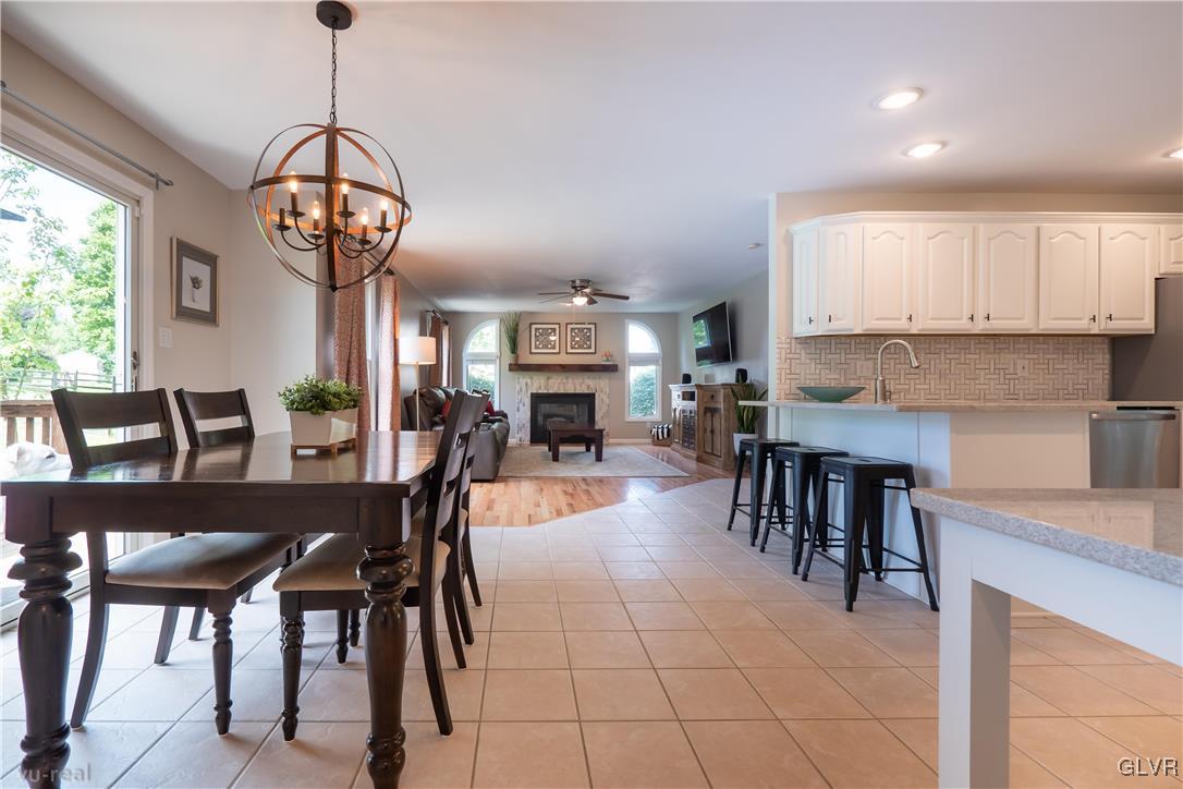 1640 Deer Path Road Easton, PA 18040 - Photo 14 of 39 a view of a dining room with furniture window and wooden floor
