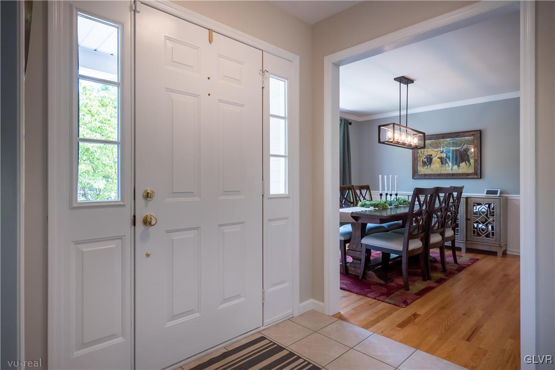 1640 Deer Path Road Easton, PA 18040 - Photo 2 of 39 a view of a dining room with furniture window and wooden floor