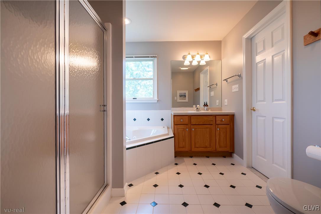 1640 Deer Path Road Easton, PA 18040 - Photo 24 of 39 a bathroom with a sink a toilet and shower