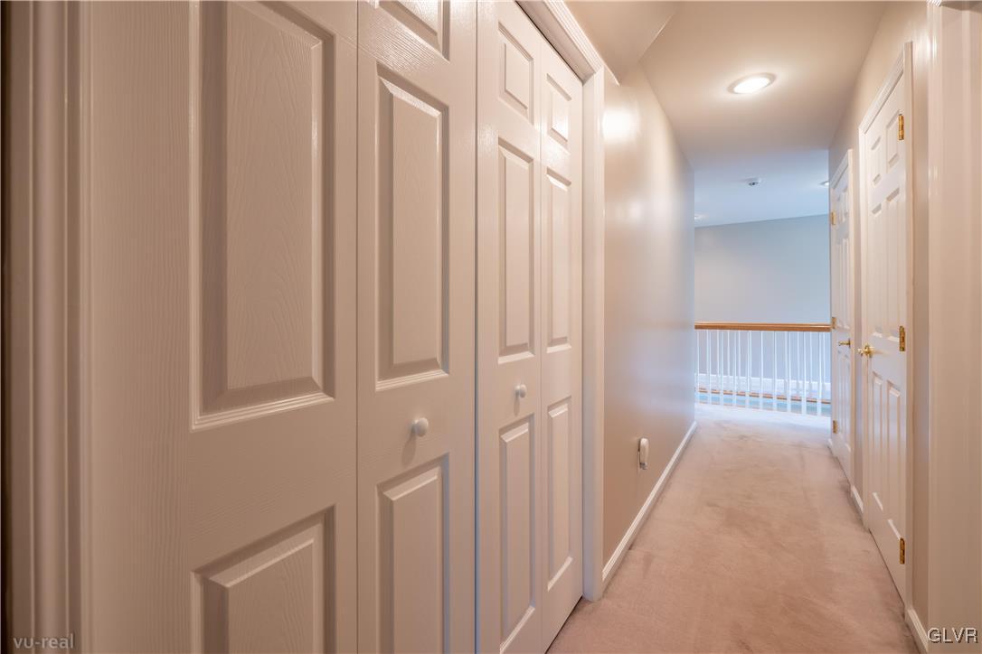 1640 Deer Path Road Easton, PA 18040 - Photo 29 of 39 a view of a hallway with a wooden door