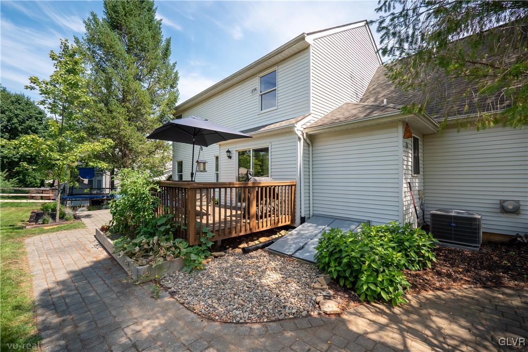 1640 Deer Path Road Easton, PA 18040 - Photo 33 of 39 a view of a house with wooden fence next to a yard