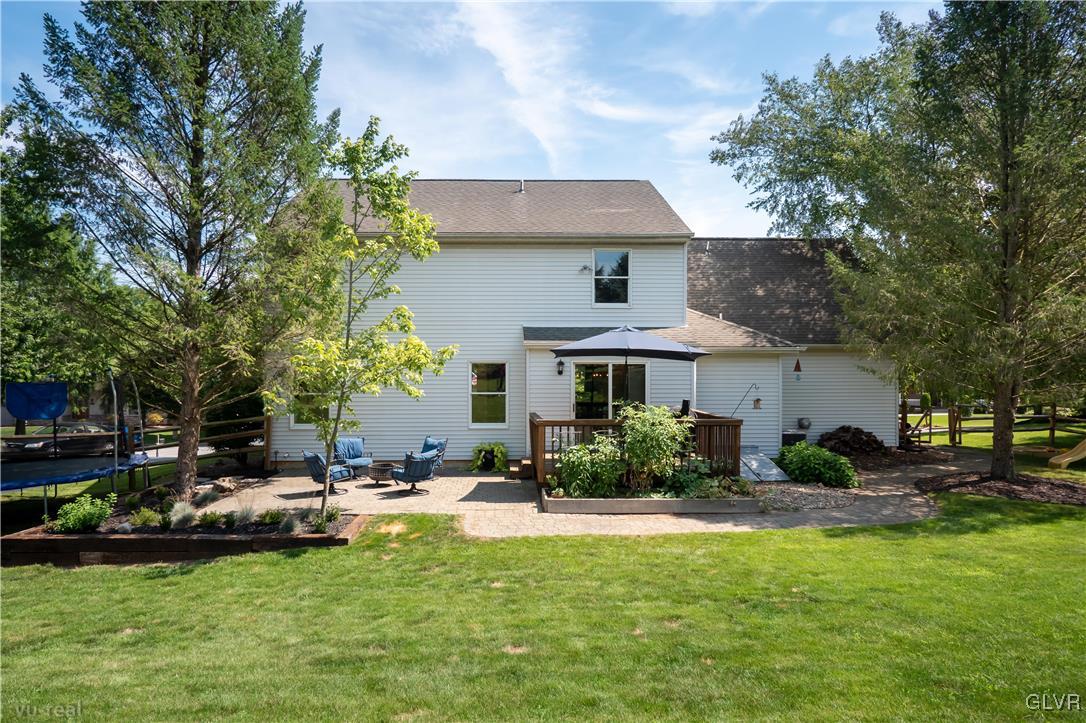 1640 Deer Path Road Easton, PA 18040 - Photo 36 of 39 a front view of a house with garden and trees
