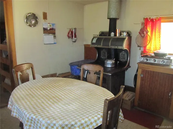 a bedroom with a bed and a table in it