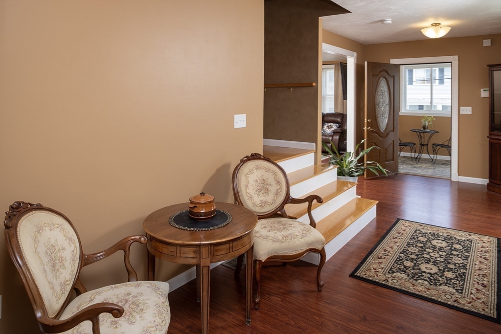 67 Newport Road Hull, MA 02045 - Photo 6 of 26 a living room with furniture and wooden floor