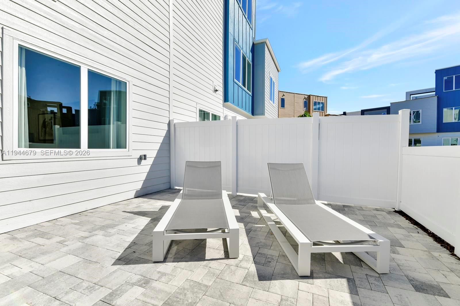 7740 Sandy Ridge Drive, Unit 136 Kissimmee, FL 34747 - Photo 21 of 26 a backyard of a house