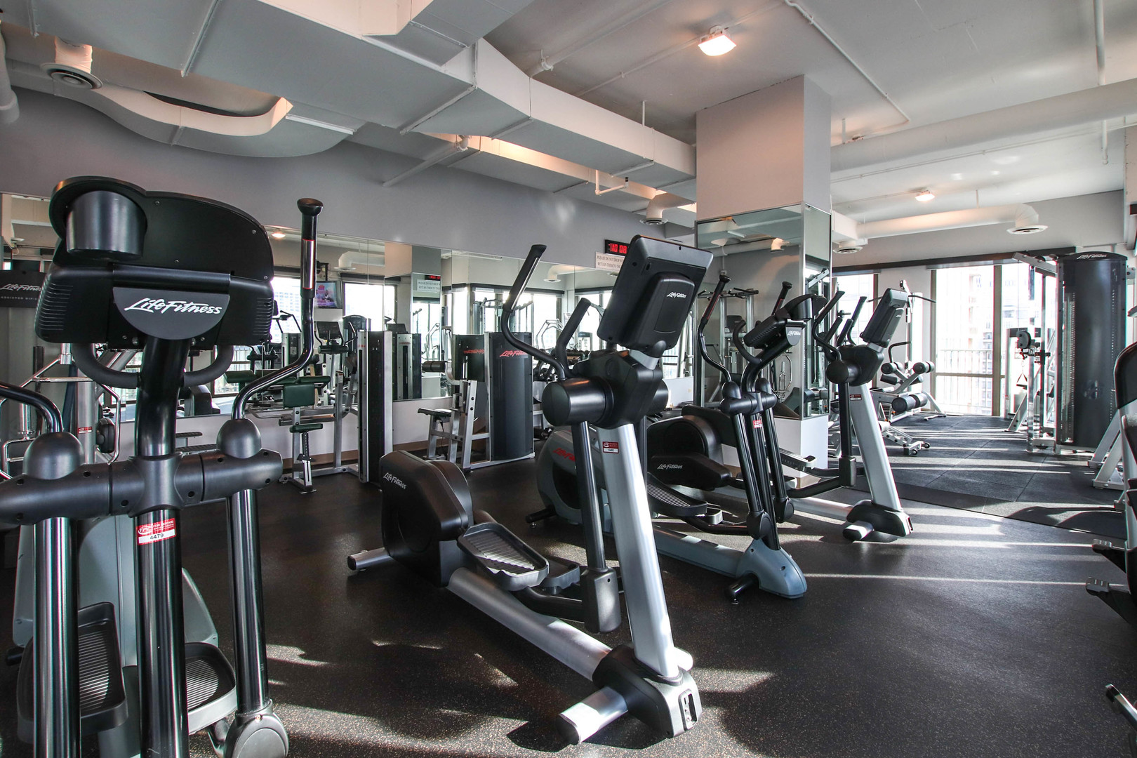 2 East Erie Street, Unit 2101 Chicago, IL 60611 - Photo 17 of 19 a view of a room with gym equipment