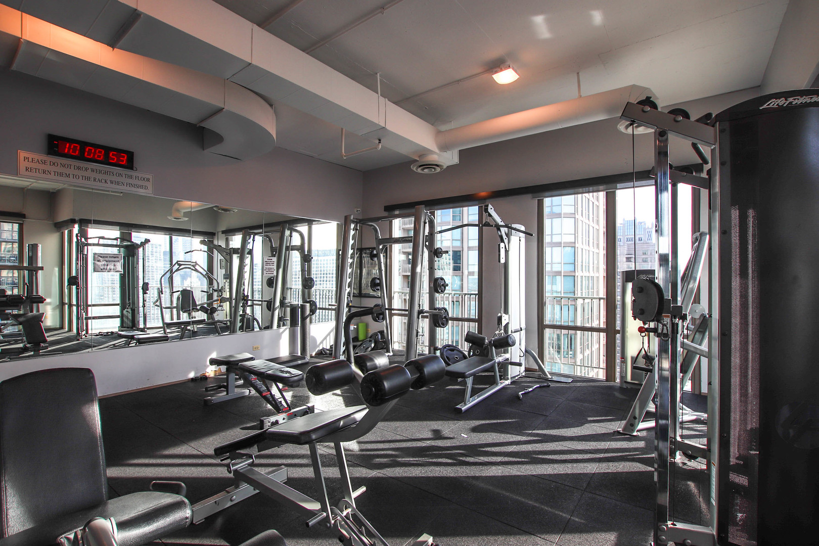 2 East Erie Street, Unit 2101 Chicago, IL 60611 - Photo 18 of 19 a view of a room with gym equipment
