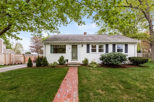 18 Mountain Road Waltham, MA 02451 - Photo 1 of 22 a front view of a house with a yard