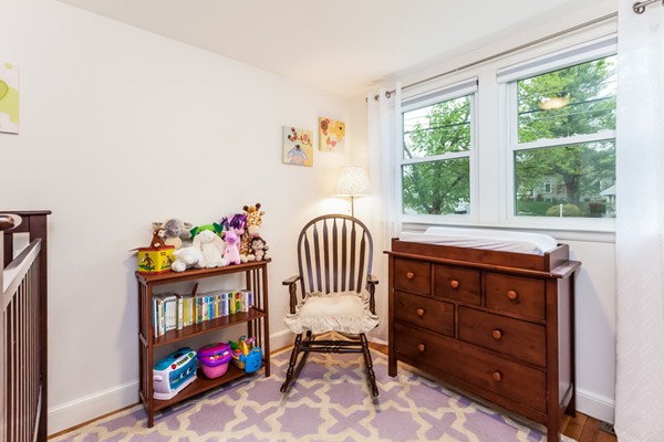 18 Mountain Road Waltham, MA 02451 - Photo 13 of 22 a bedroom with a bed and a window