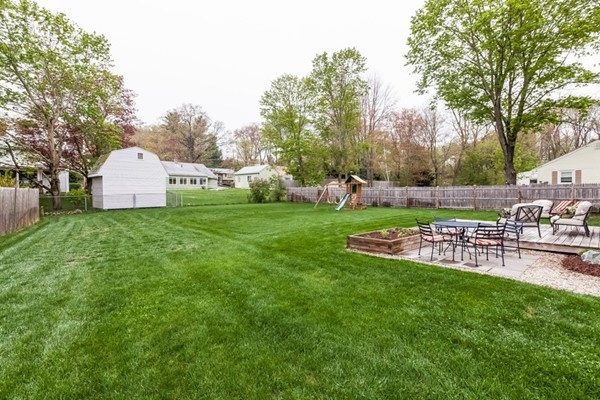 18 Mountain Road Waltham, MA 02451 - Photo 21 of 22 a view of a house with a yard and sitting area