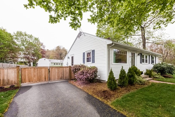 18 Mountain Road Waltham, MA 02451 - Photo 4 of 22 a view of a house with a yard and a large tree